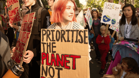 Person holding a sign at a protest